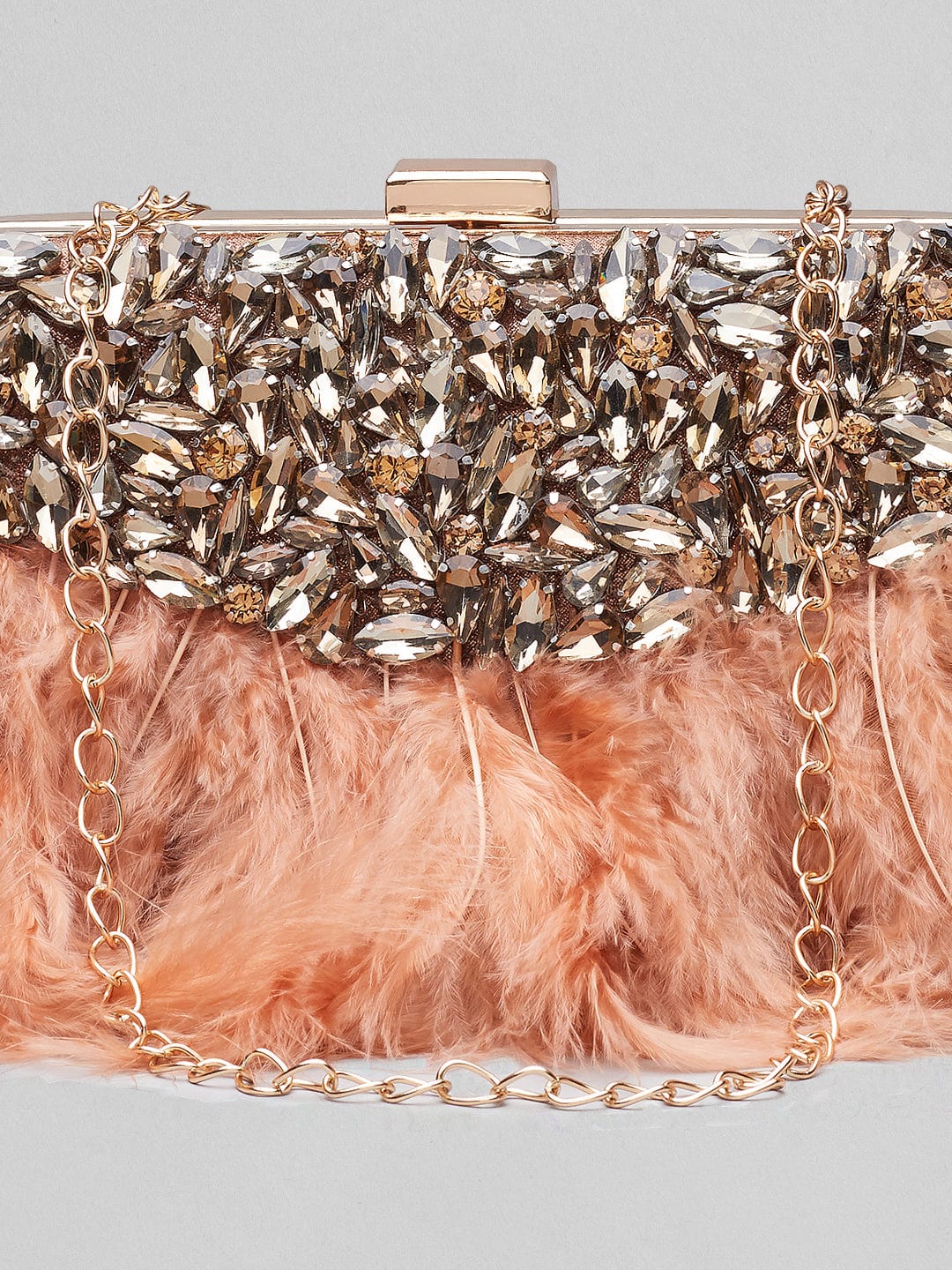 Bolso de fiesta de cristales y plumas en rosa