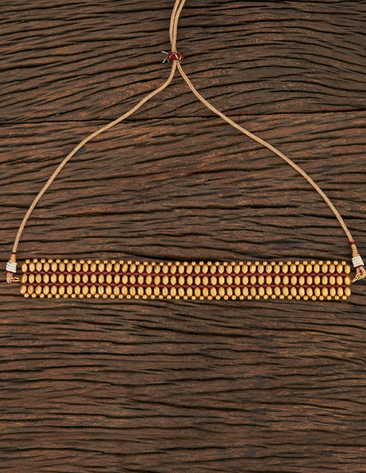 Choker dorado con pedrería granate